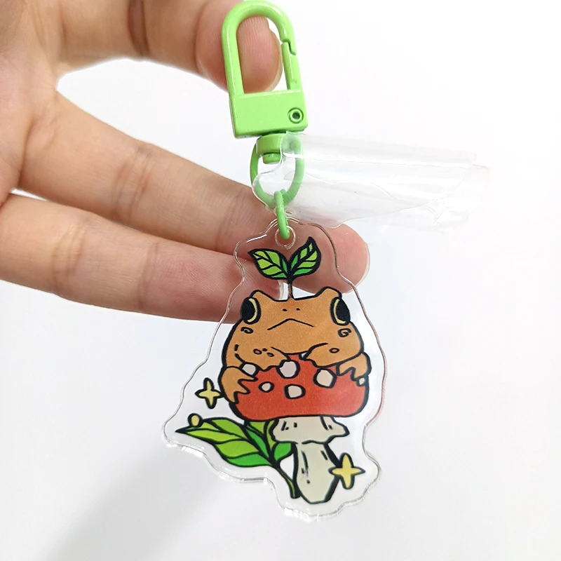 Promotion cute anime glow shaker custom acrylic charms plastic keychain
