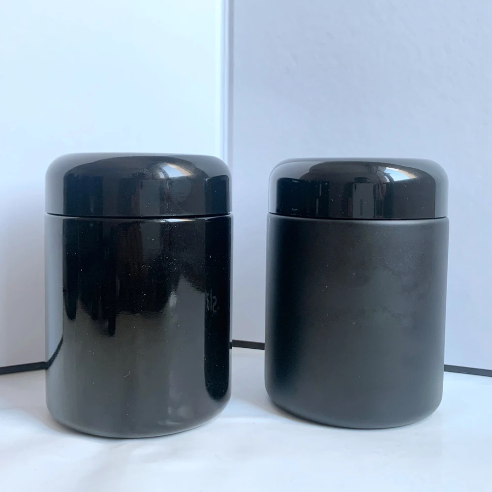 Wholesale Luxury Frosted Black Airtight Glass Packaging Jars UV Spice Herb Storage Stash Jar With Bakelite Cap