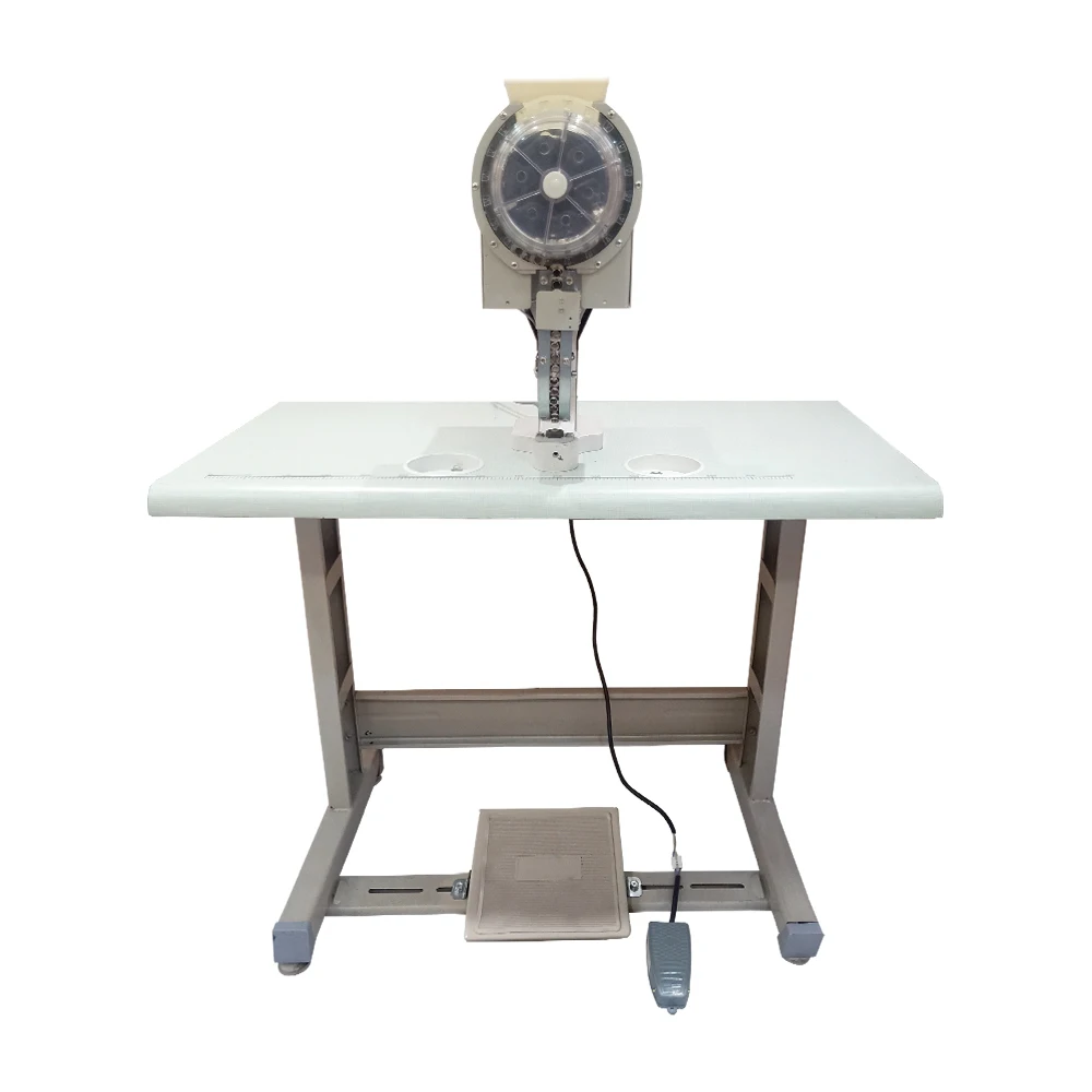 Automatic punching machine for punching 10mm and 12mm eyelets