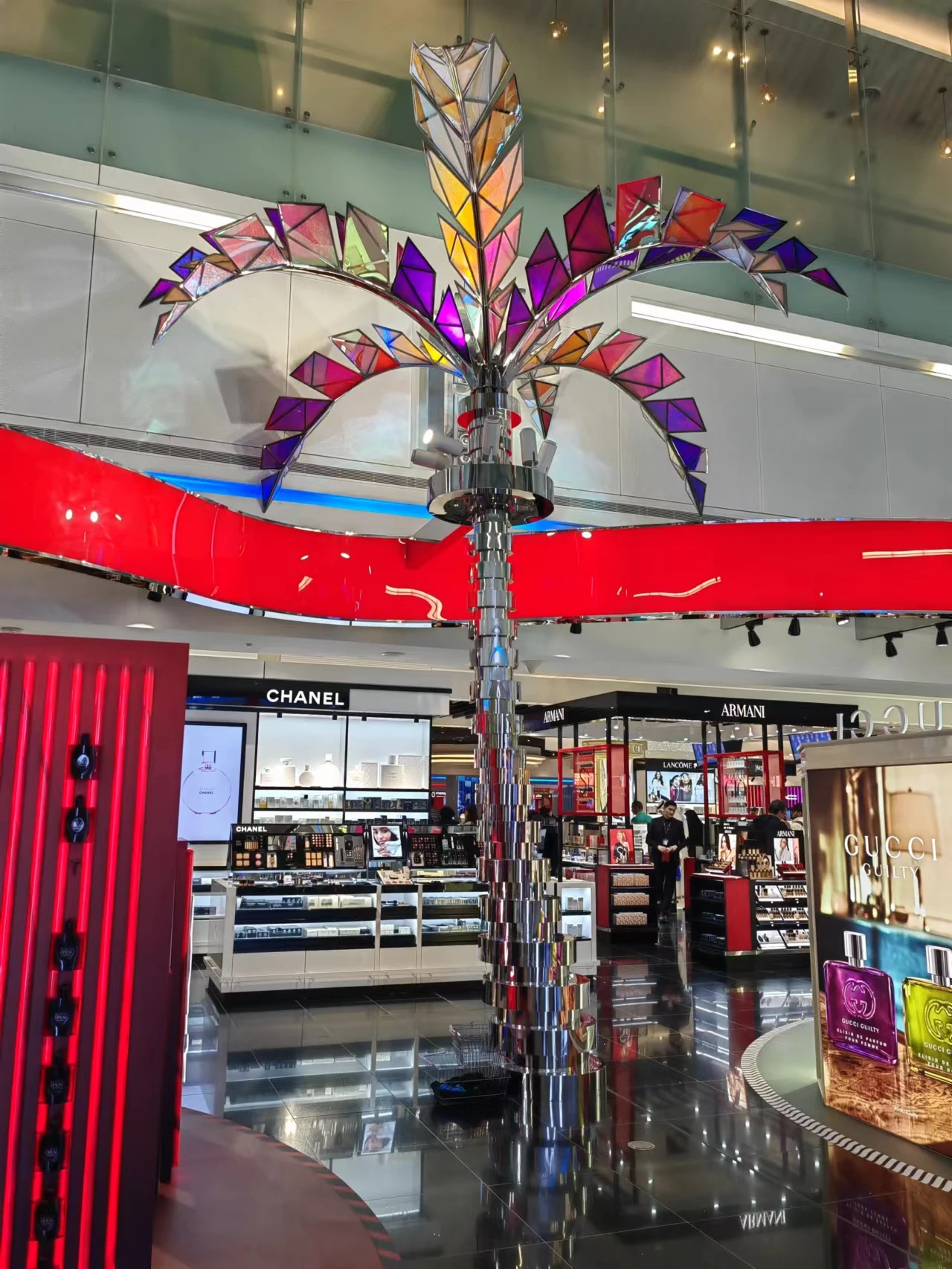 large modern dubai airport stainless steel tree statue metal decor craft shopping mall window display public art sculpture
