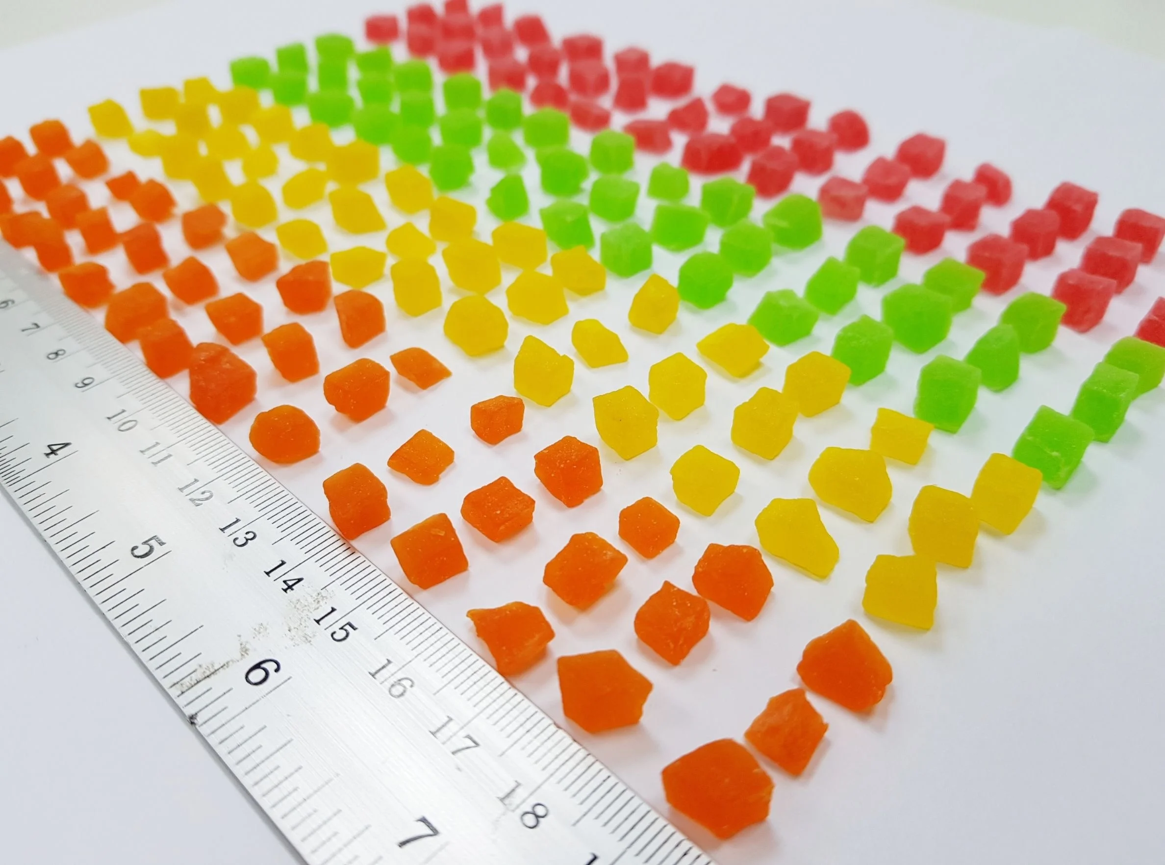 Dried candied Papaya dices 5-7 mm mixed colors added Thailand