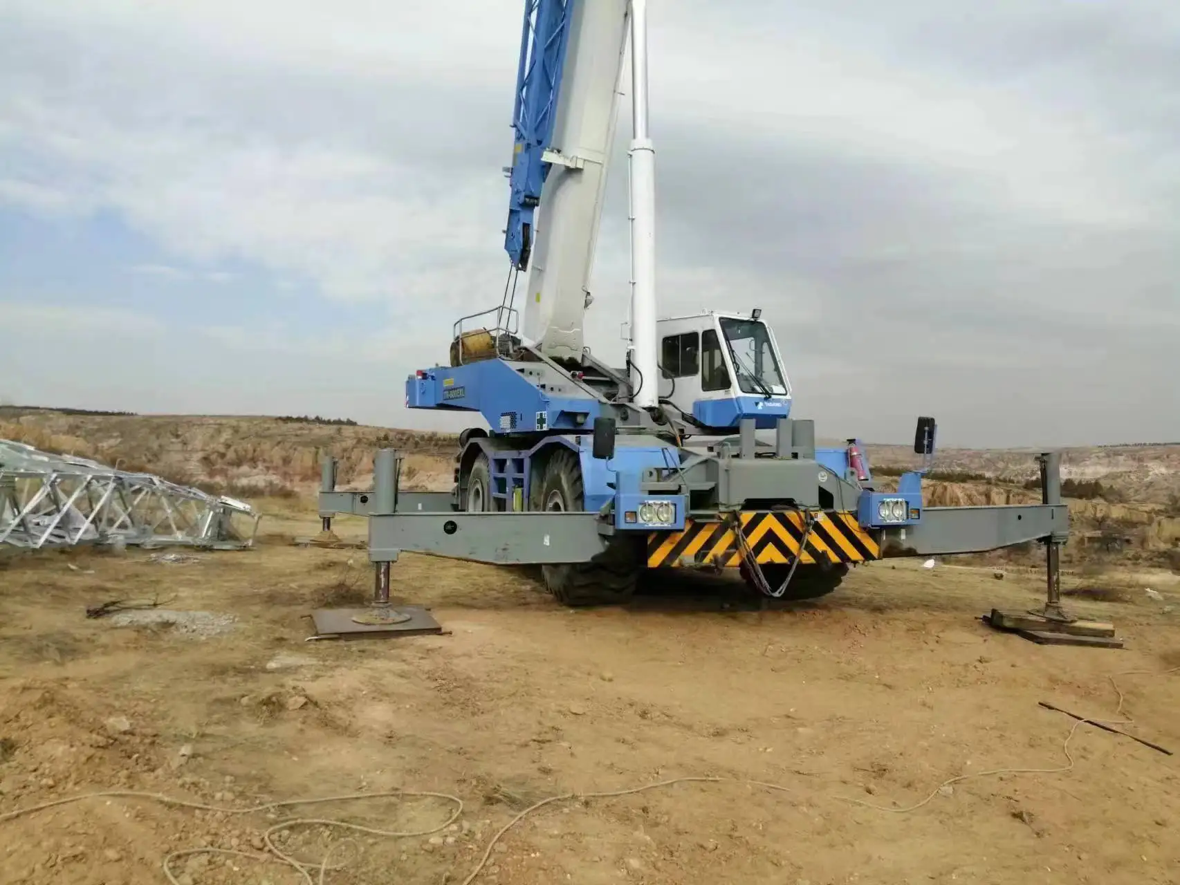 Подержанный 60-тонный автокран Тадано TR-600EXL пересеченного крана