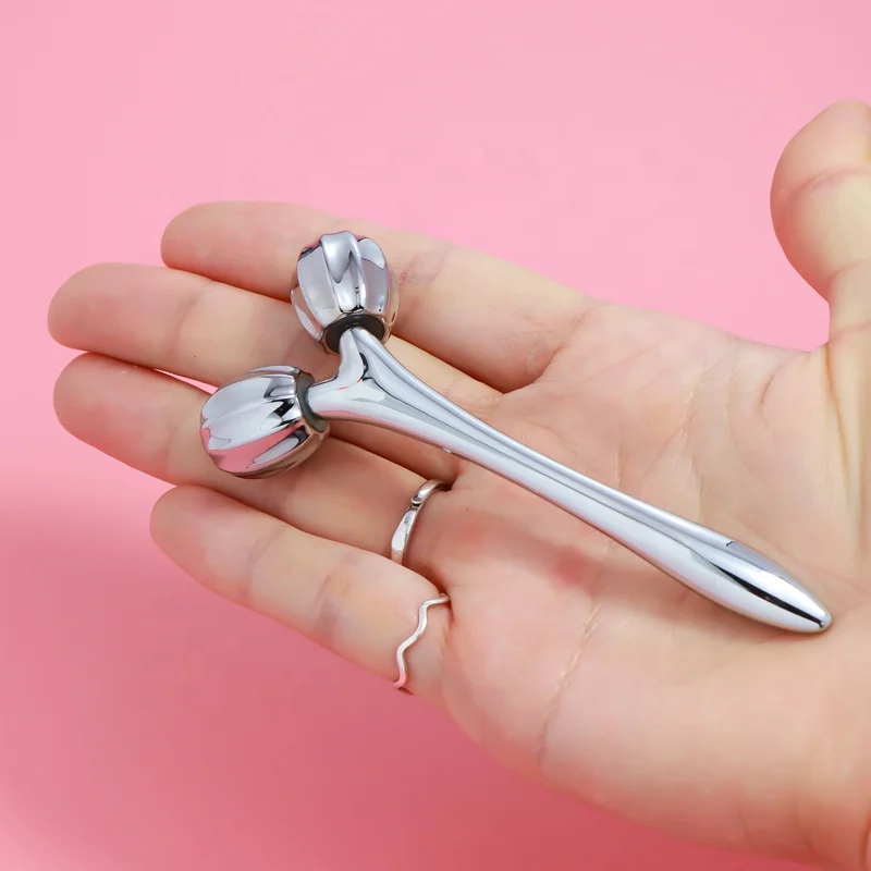 Wholesale V face lifting cosmetic massage handheld y shape facial 3d rolling massager with pumpkin balls