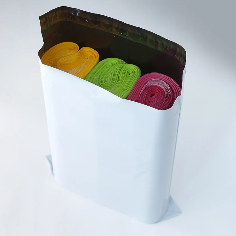 small size 100pcs/roll self adhesive seal dhl plastic mailing courier bag for clothing