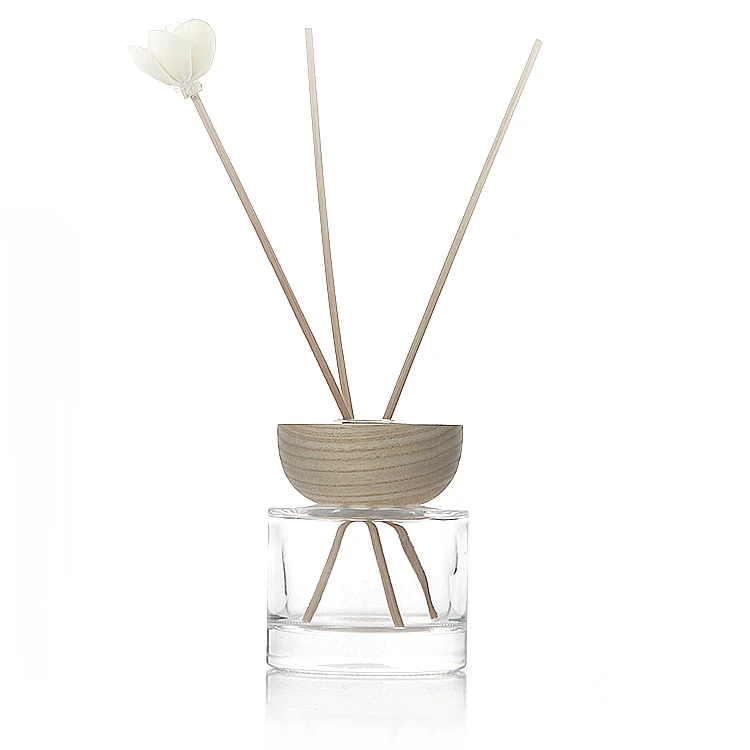 Custom logo 100ml round reed diffuser bottle with wooden lid luxury perfume diffuser bottle for hotel home decor
