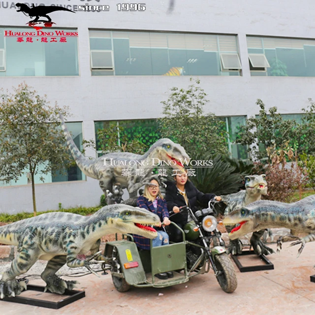 Lifelike animatronic dinosaur raptor with motorcycle