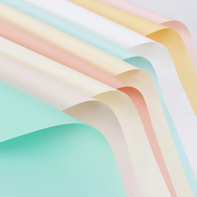 Wholesale rose floral paper pack korean style waterproof solid colors flowers wrapping paper packaging for bouquet