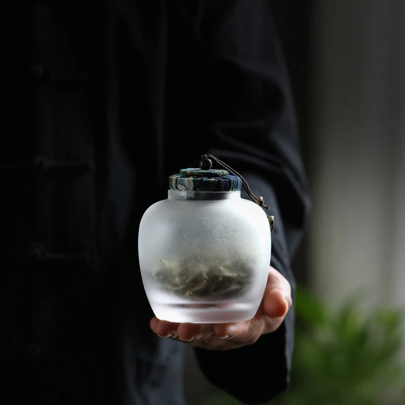 
Wholesale Customized Frosted glass storage jar with a cover moistureproof handmade glass tea canisters 