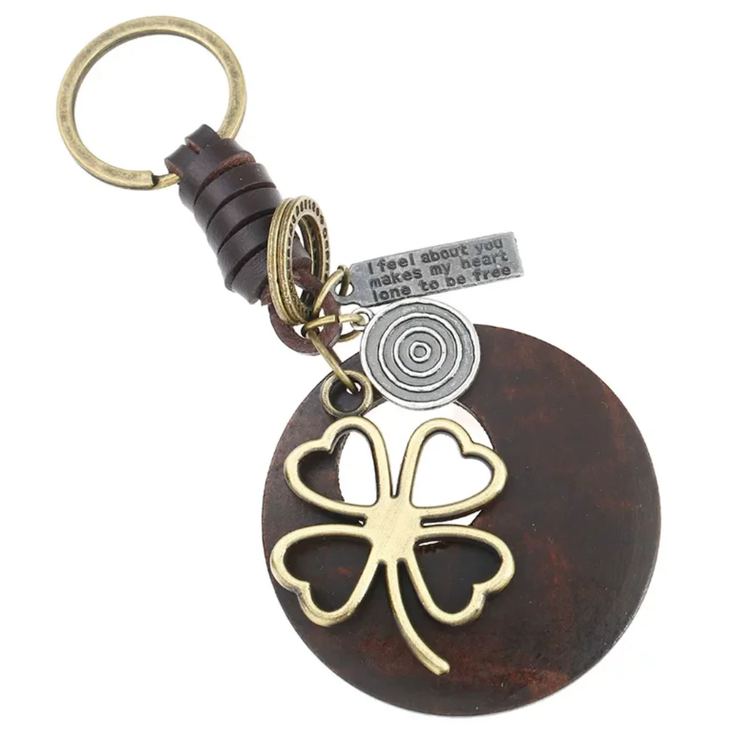 Hot sale antique gold new clover elephant pendant alloy leather weave key chain