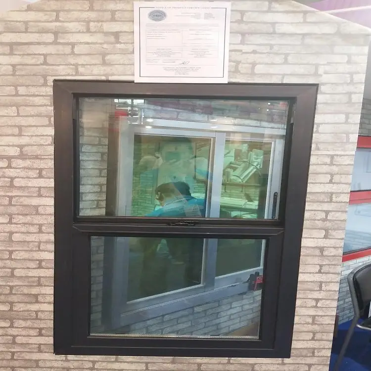 Black vinyl hung window with nail fin girds and  NFRC certification
