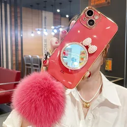 Fashion Luxury Bow Rhinestones Mirror Back Cover Plating TPU Fur Ball hand strap Girls Phone Case for iPhone 13 12 Pro Max