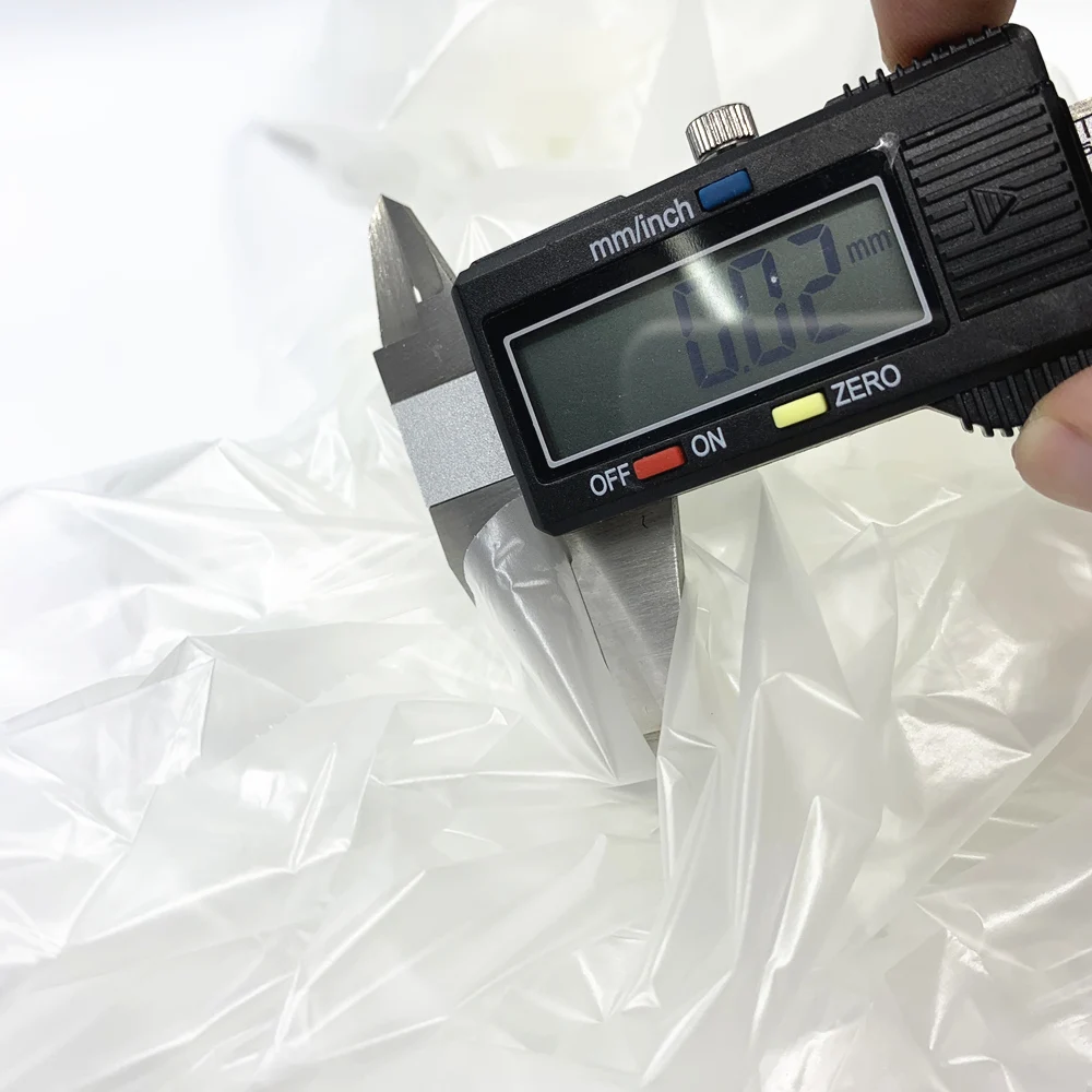 15 Microns Thickness Low Breathable White And Clear Laminated Polyurethane TPU Film For Wound Dressing