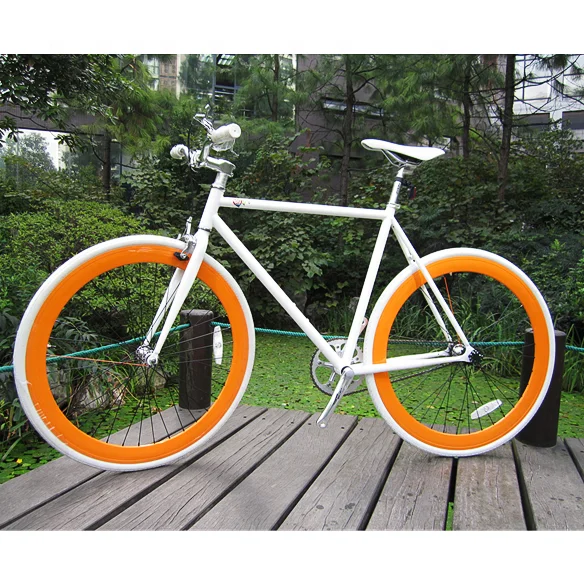 700C single speed with orange rims raiser bar colourful fixed gear bike