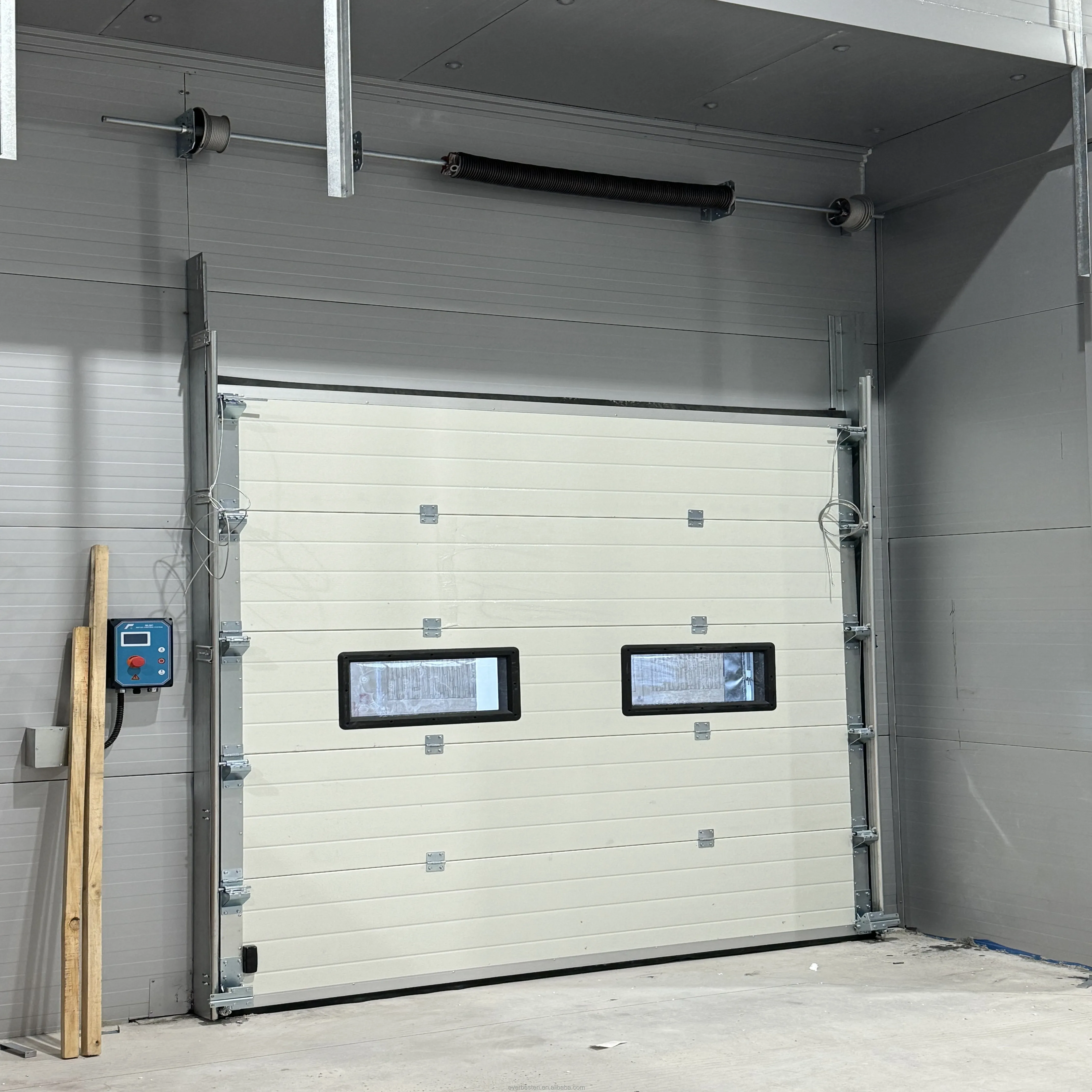 China Good Quality Vertical Overhead Electric Warehouse Industrial Sectional lifting Door