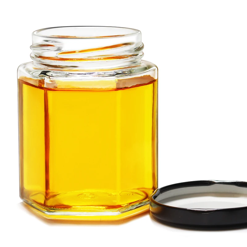 Cheap Spice Bottle Storage Hexagonal Honey Jam Food Small glass bottles for honey packing with Lid