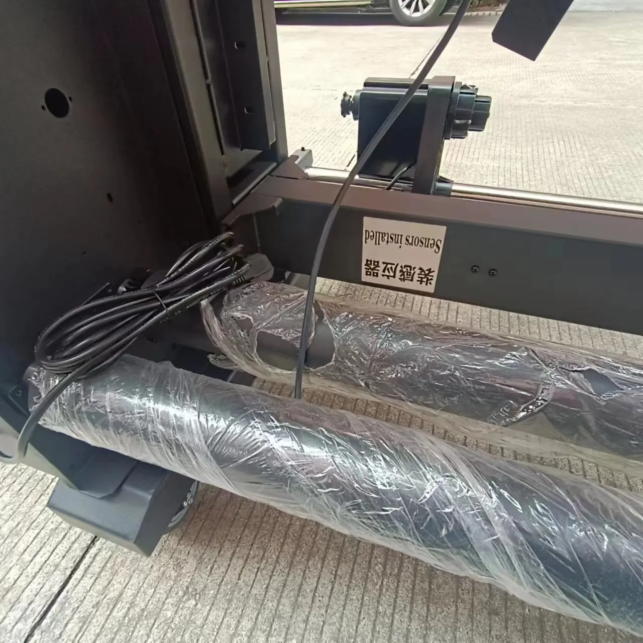 Large format printer automatic paper system