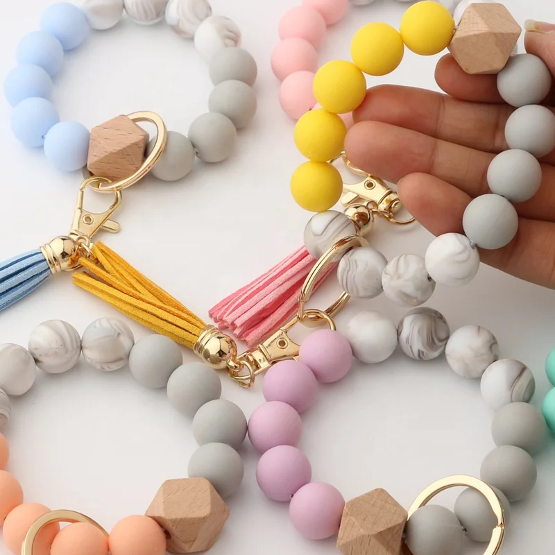 Amazon new bracelet key ring food grade silicone beads bracelet leather tassel wooden beads key chain for women