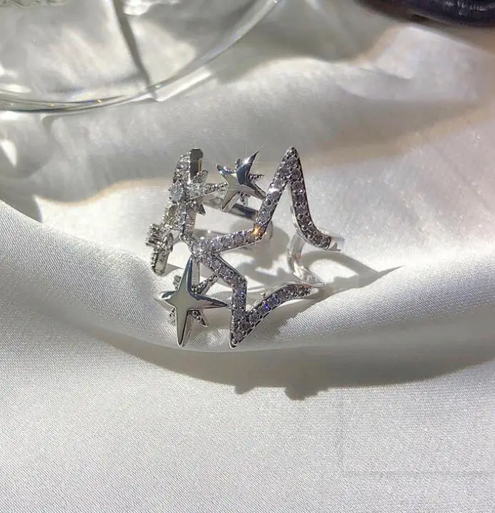 
Korean new design fashion jewelry copper inlaid zircon light luxury opening hollow five-pointed star female party star prom ring 