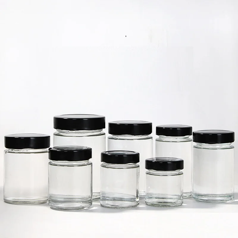 bottle jar packaging round large Glass Clear Round Jars with Black Lids For Storage Food Honey jar for canned food packaging