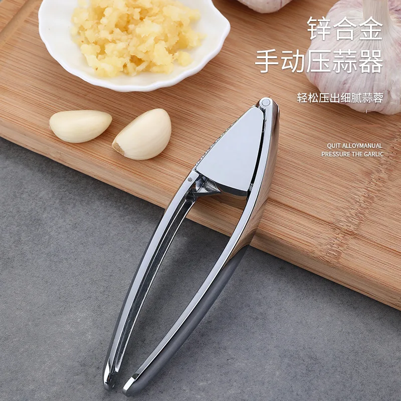 Manual kitchen gadget Garlic Press meshed garlic device