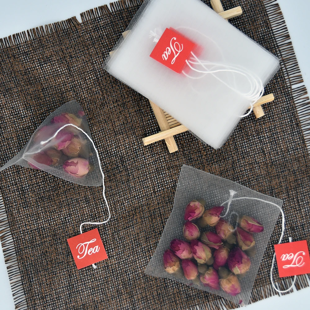 58 X 70mm Biodegradable Transparent PLA Corn Fiber Tea Bags  Heat Seal Pyramid Filters