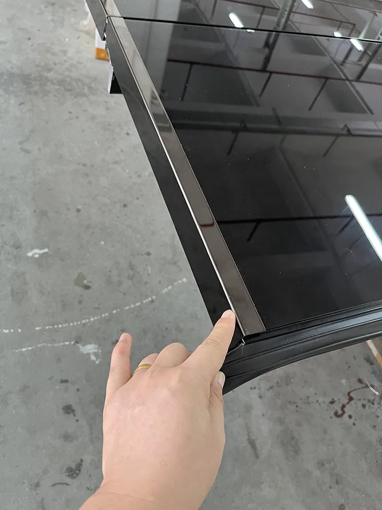Aluminum alloy black mirror tempered glass frameless reflective electric villa garage door manufacturer