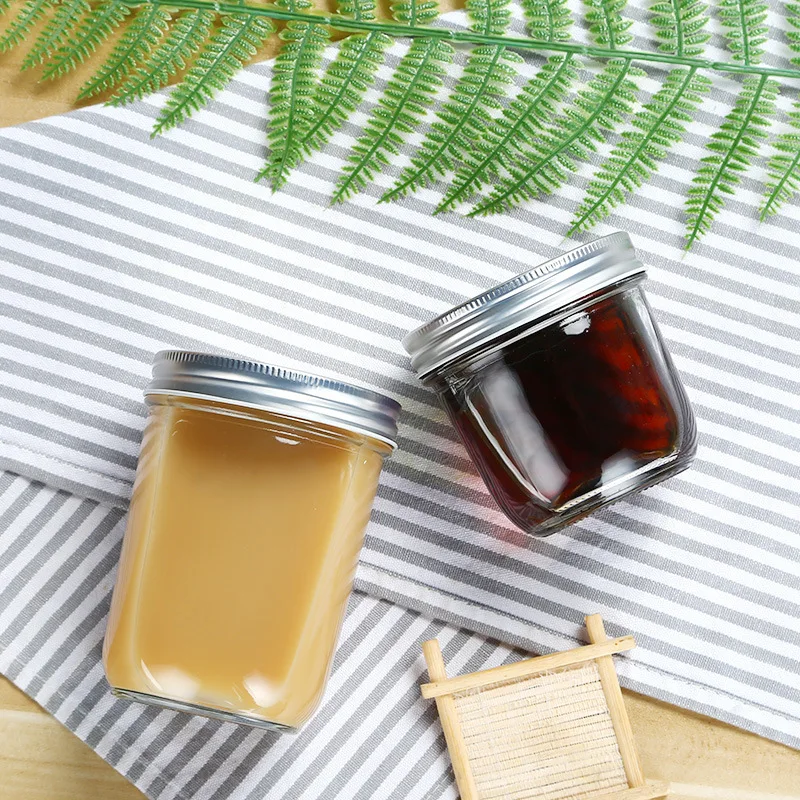 
High quality borosilicate airtight kitchen food cans round glass jam honey pickles jars with lids 