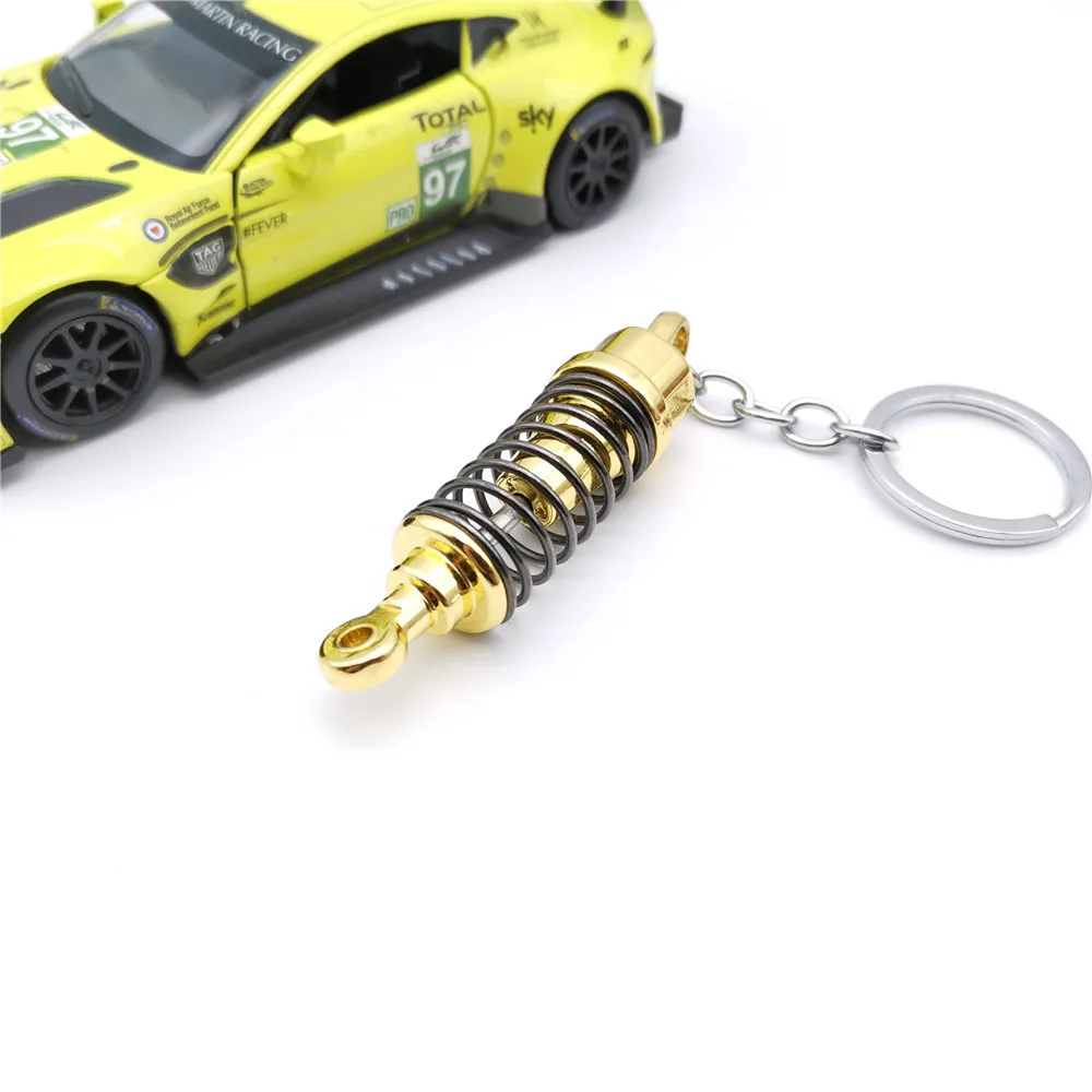 Modified spring shock absorber vibration simulation alloy metal key chain hanging gifts