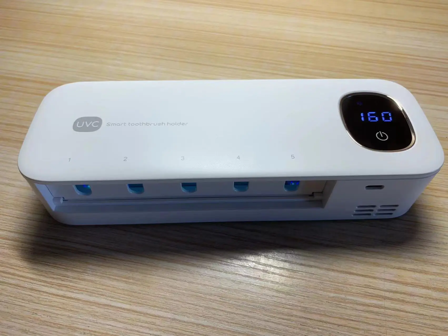 rechargeable Automatic UVC Toothbrush Disinfector Wall Mount Toothbrush Squeezer Holder Toothbrush Sterlizer and holder