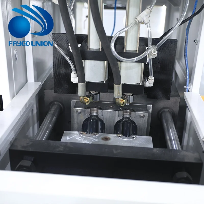 Suzhou Yuda  2 Cavity Semi Automatic One Heater One/Two Blower 150ml-2000ml PET Bottle Blower Molding Machine for Small Business
