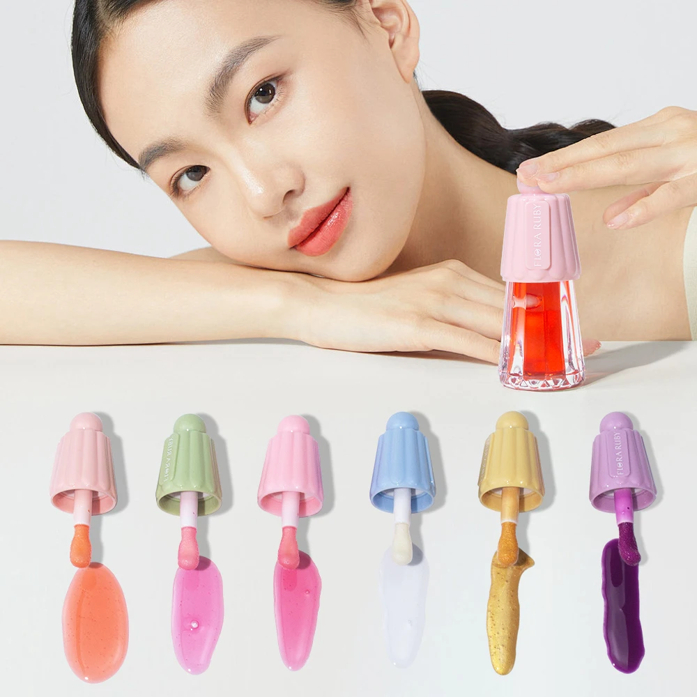 Flora Ruby korean private label cute gold tinted clear waterproof plumping fat gloss lip glow balm oil plump lip gloss stain