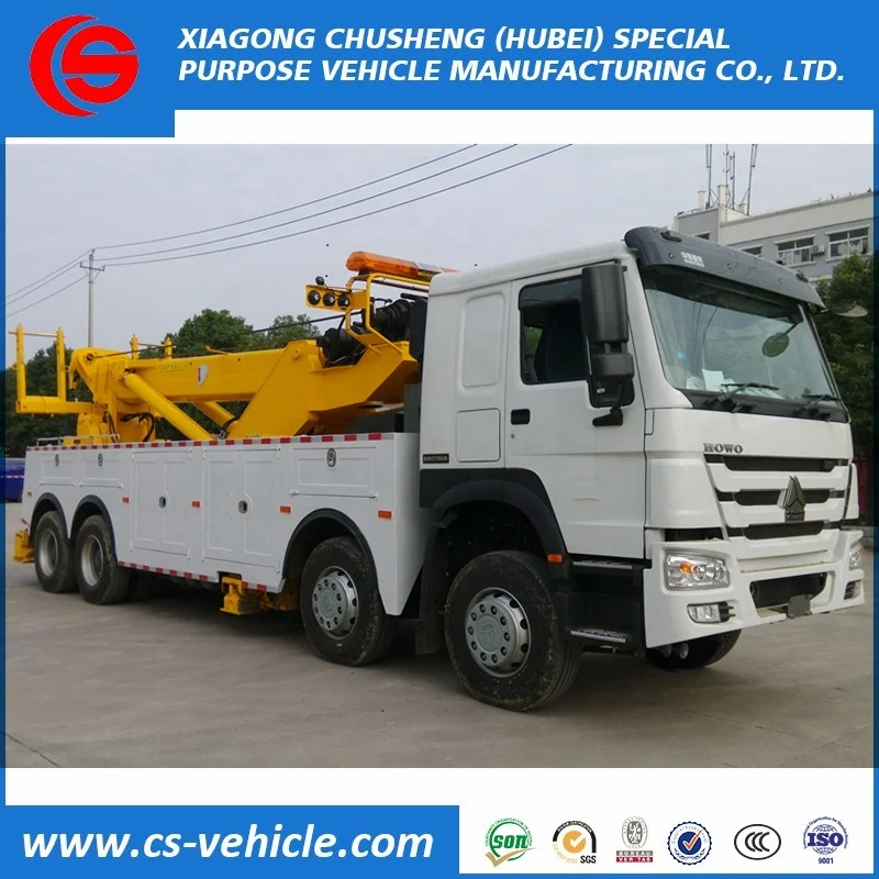 HOWO 360 degree rotation Crane 30tons Lifting 12 wheel heavy duty wrecker tow truck for sale