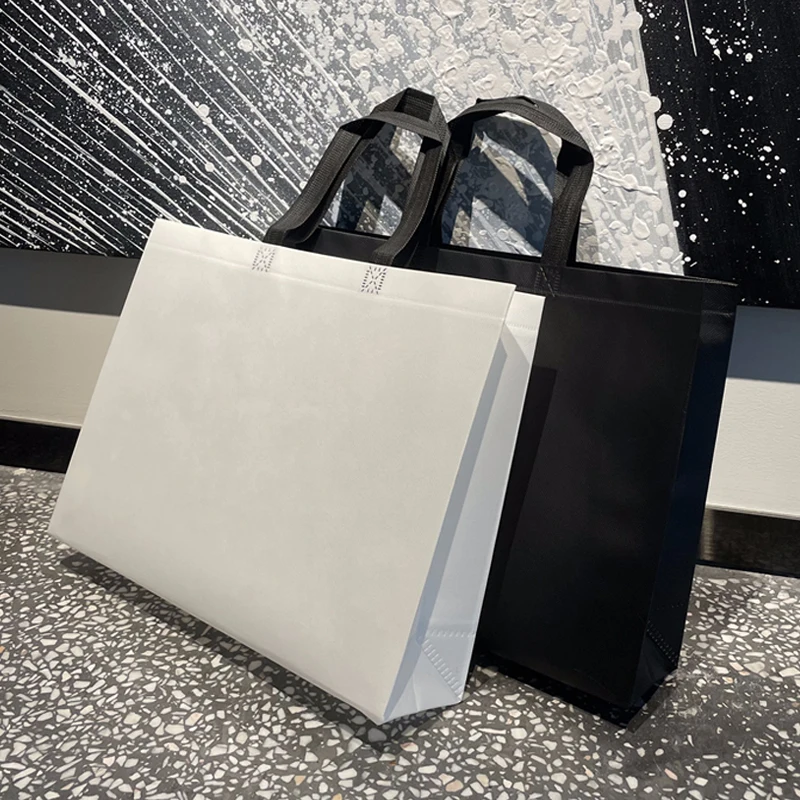 Wholesale gold silver non-woven portable shopping bag custom LOGO gift bag Reusable handbag Clothing packaging bags Eco-friendly