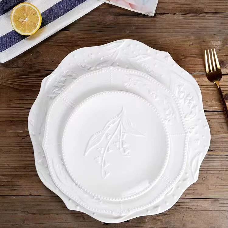 Wholesale Irregular Retro Handmade Glazed Three Dimensional Relief Bell Orchid Nordic Matte White Dessert Ceramic Dinner Plates