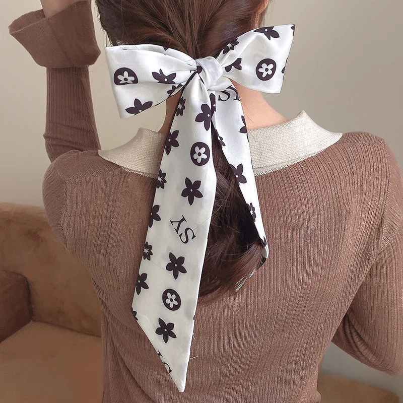 Thin and narrow strip tie women 2021 French retro hair scarf ins wind gentle and elegant hair band tie strap