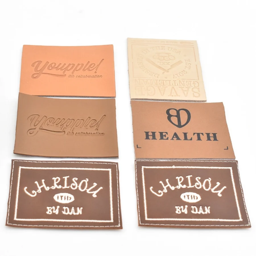 Custom Logo Debossed Label Jeans Self Adhesive Leather Patch Clothing Embossed Logo PU Leather Label For Garment