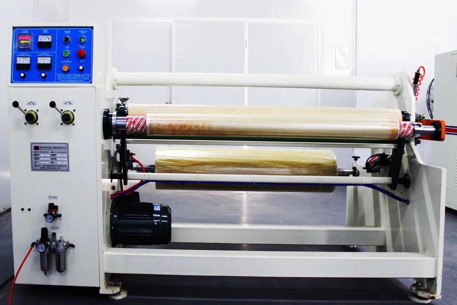 High speed jumbo roll adhesive tape rewinder machine