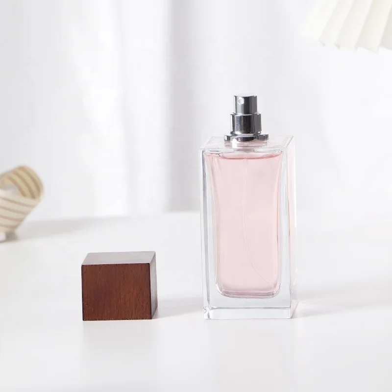 Empty hand polished crimp neck 100ml clear rectangular perfume glass spray bottle