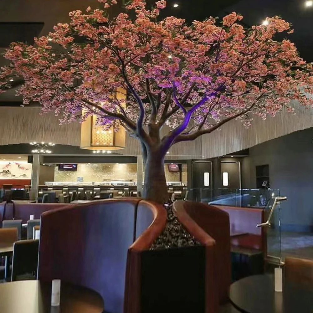 Large blossom flower tree for sitting area run along the ceiling restaurant decoration