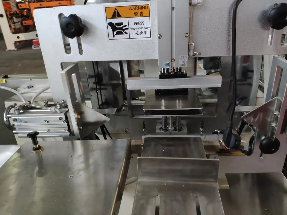 
Best Selling Semi Automatic Napkin Tissue Paper Packing Machine 