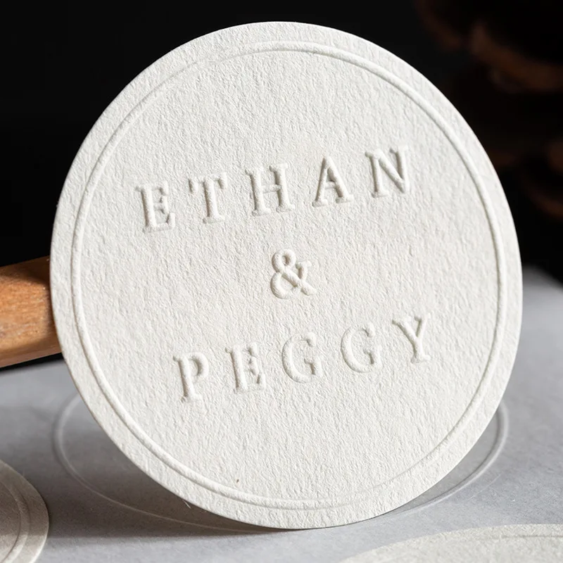 round square white textured embossed logo paper adhesive bottle sticker closure