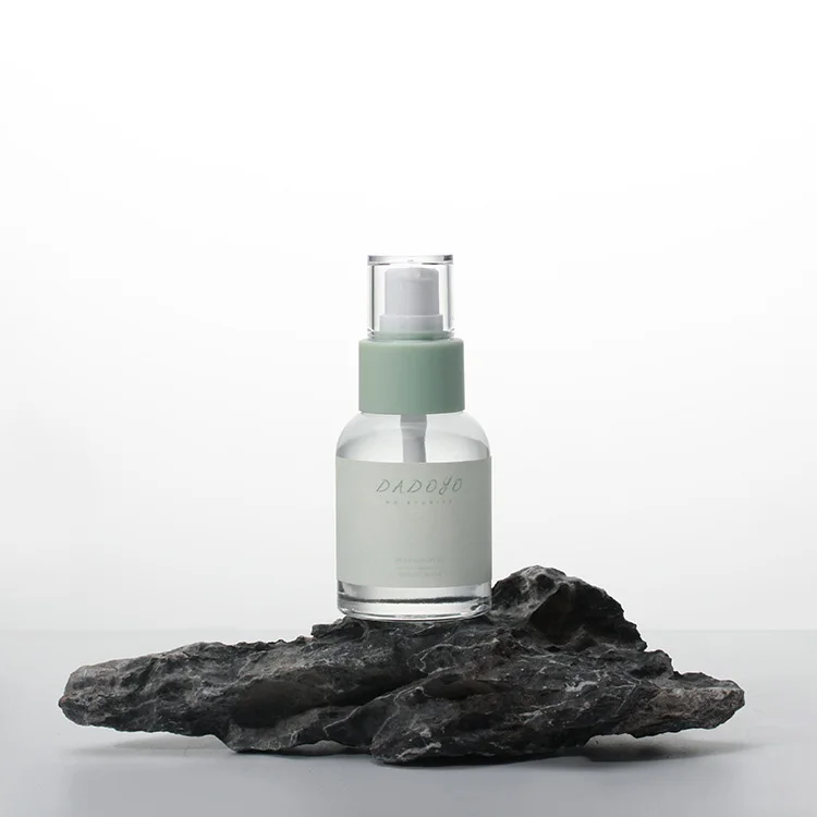 custom design 40ml 1.7oz4oz flat round shape transparent glass C essential BD oil bottle serum bottle with pump