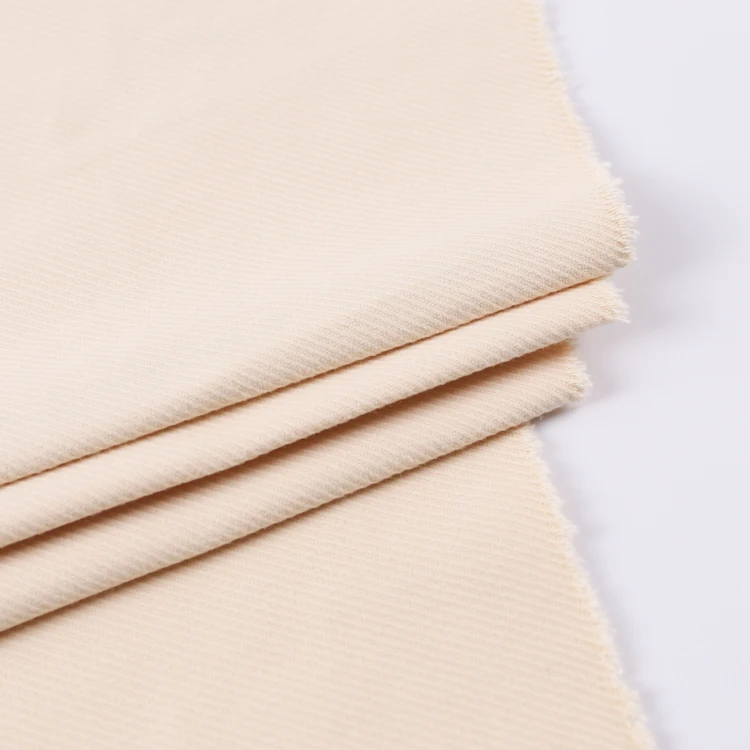Gots certified organic cotton Supply new design in stock popular winter coated twill cotton stretch fabric for clothes