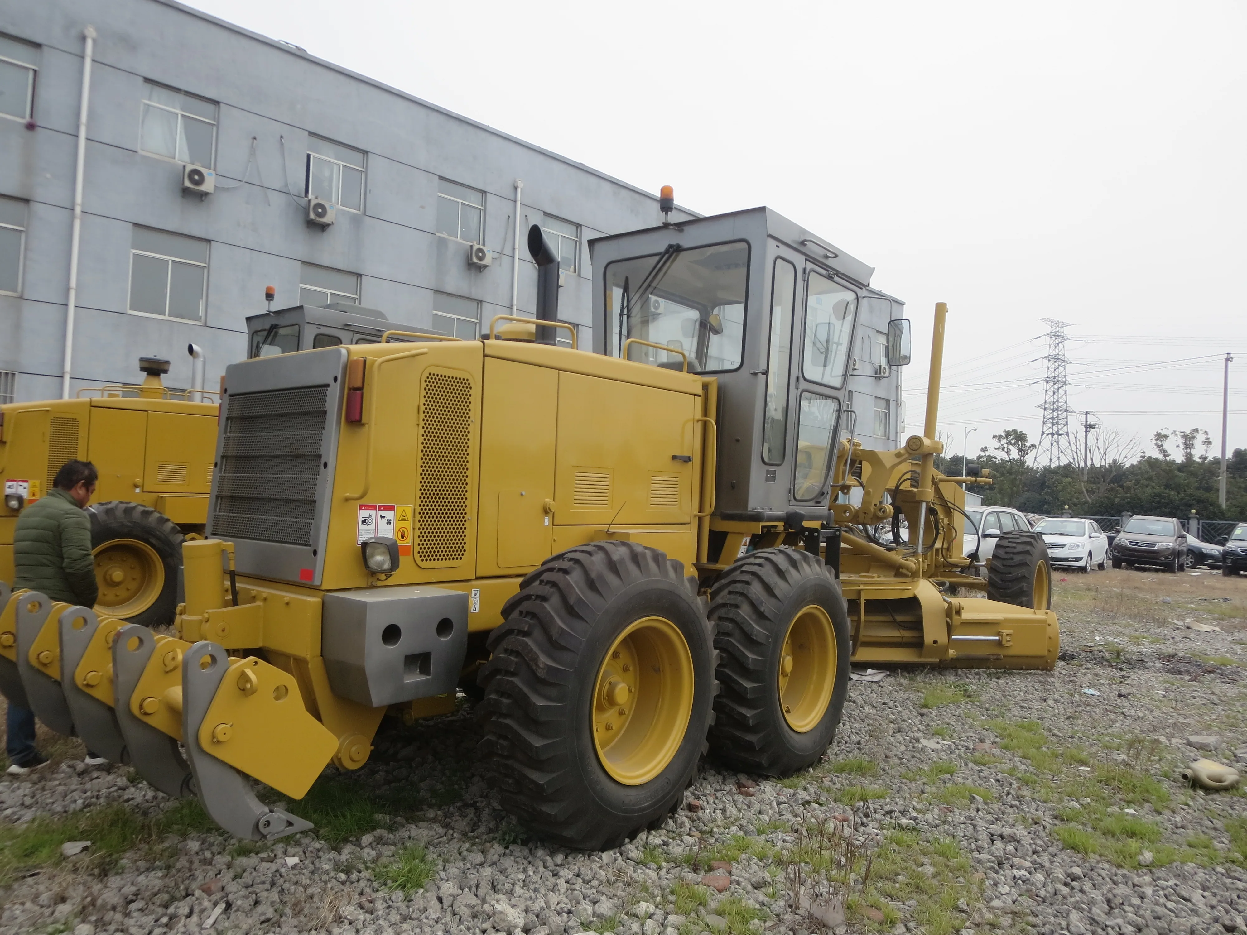 Brand new USA made original Caterpillar 140k motor grader, road construction tractor with blade and fork 140K new