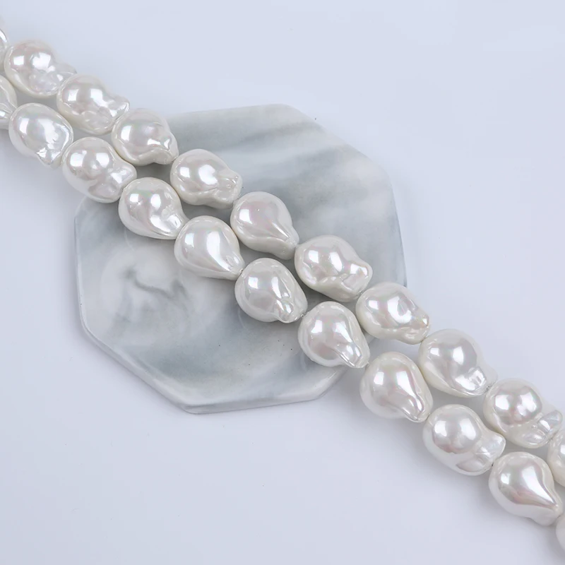 Zhuji Wholesale 16-17mm Shell Of Baroque Pearl Natural White Stands For Sale