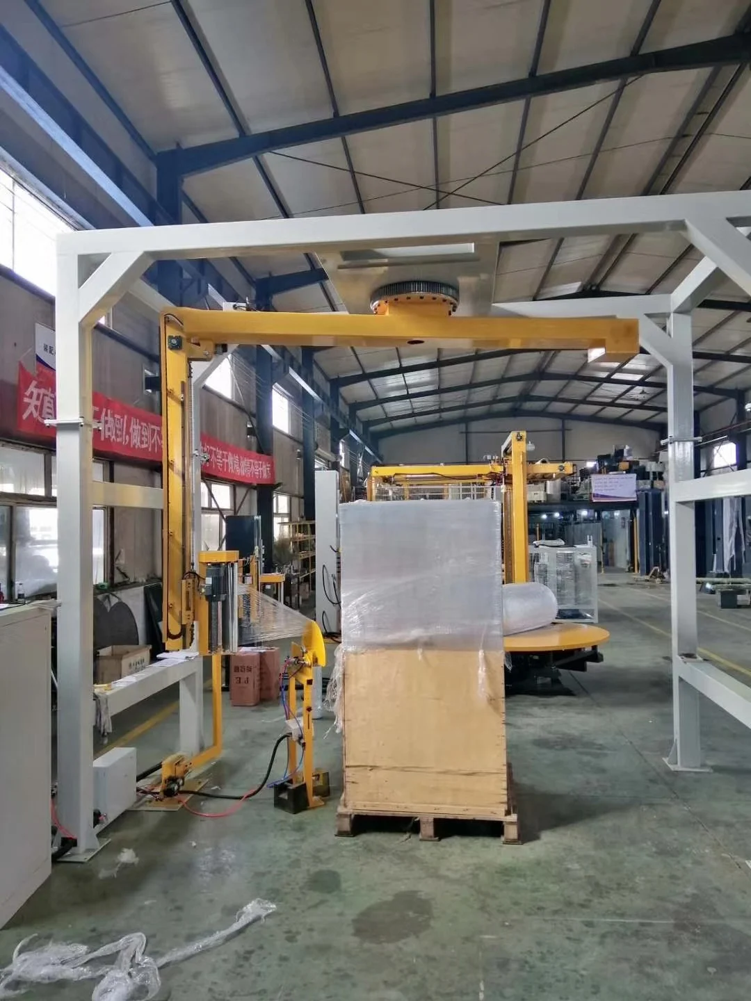Skid Stretch film Wrapper/Wrap/ Automatic Pallet Wrapping Machine with Rotary arm