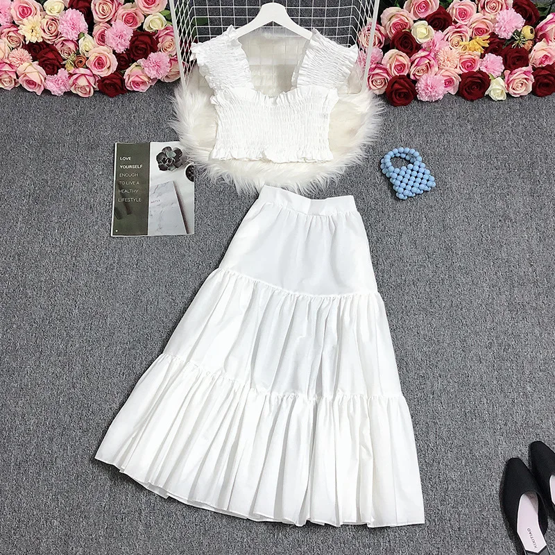 Medium length over knee high waist slim big swing cake skirt two-piece suit short open navel top