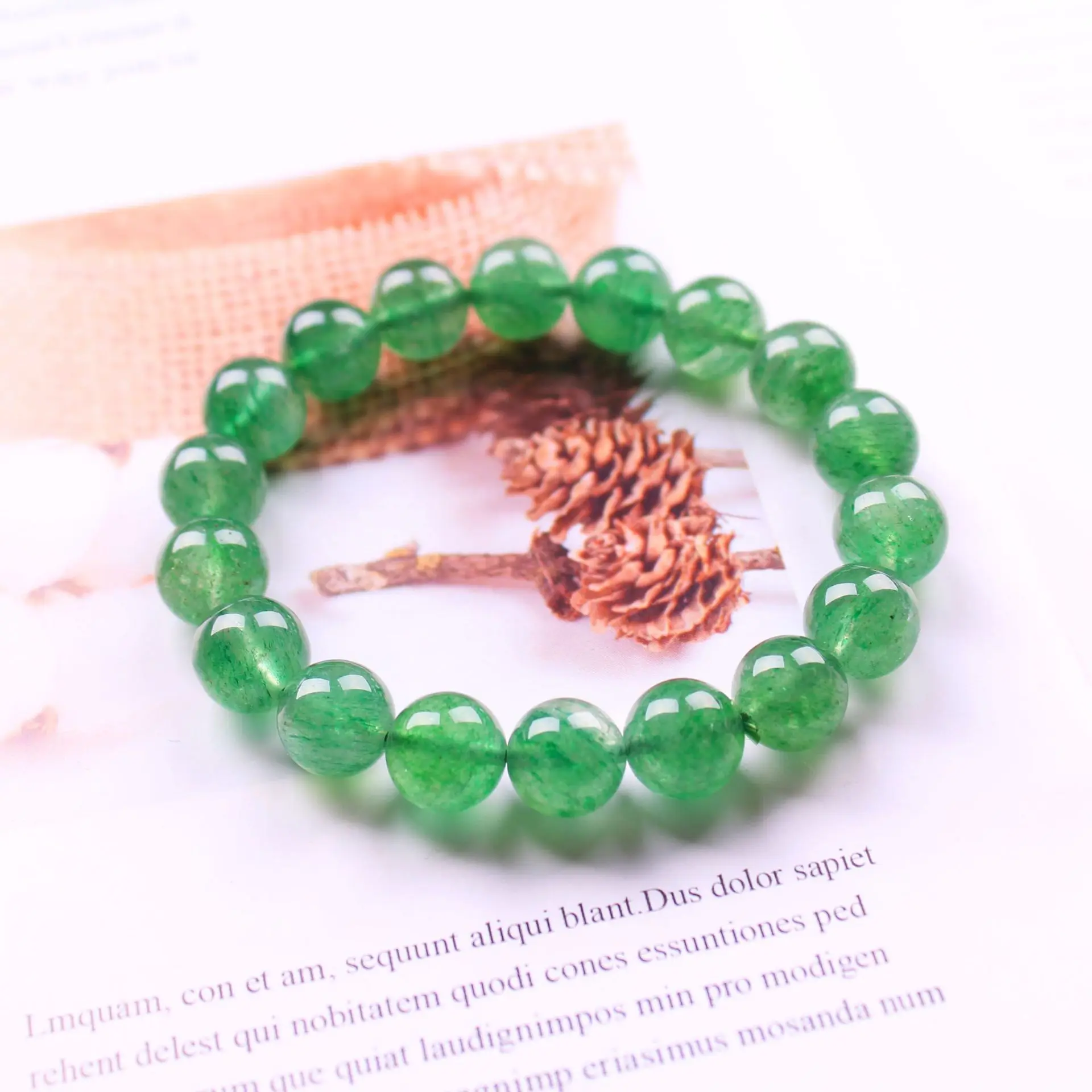Factory direct sales large stock natural round stone beads green Crystal strawberry quartz bracelets body jewelry