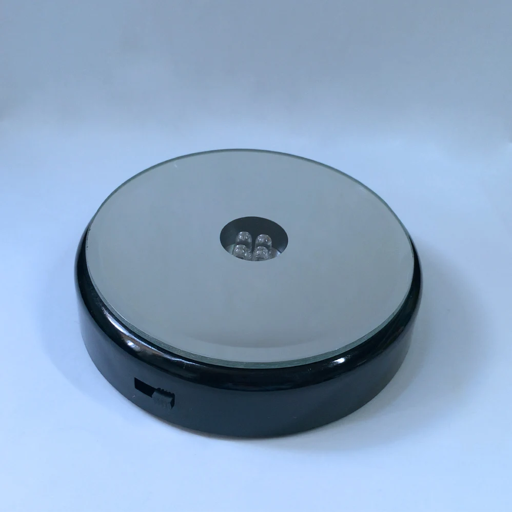 Shinny black plastic round mirror led battery light display stand base