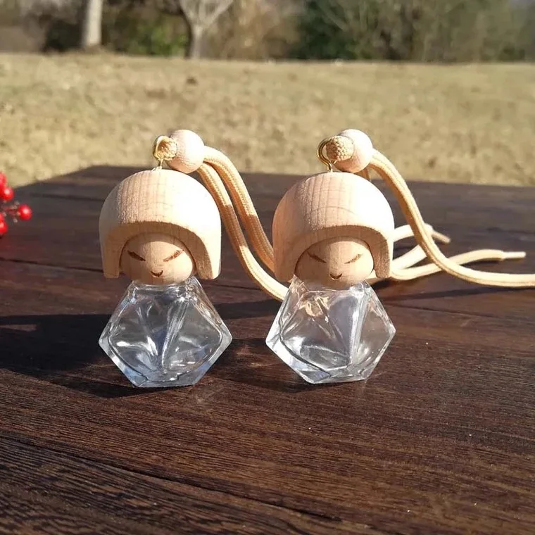 Factory wholesale high end cleardoll shaped empty car air freshener perfume glass bottle with wooden top